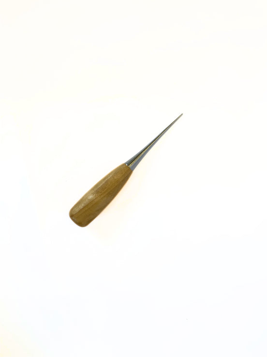 Precision metal punch with a sturdy wooden handle
